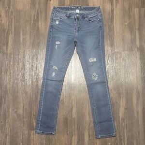 White House / Black Market Classic Distressed Skinny Jeans in Blue